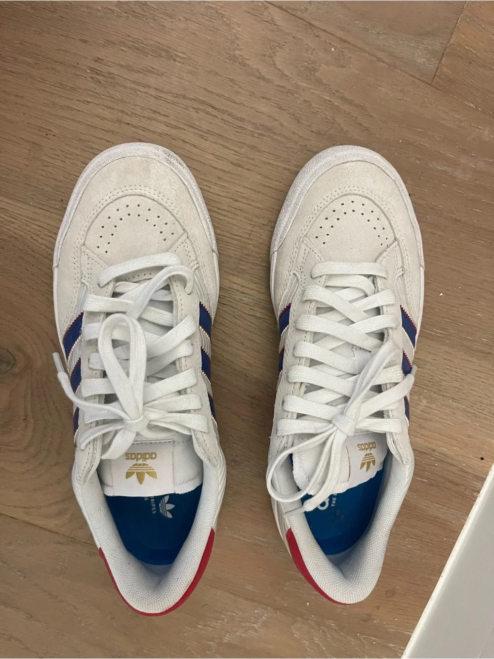 Adidas Woman’s Nora White Suede Sneakers with Blue Stripes & Red Heel